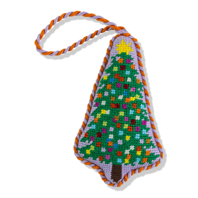 Colorful crocheted Christmas tree ornament with a braided handle on a white background