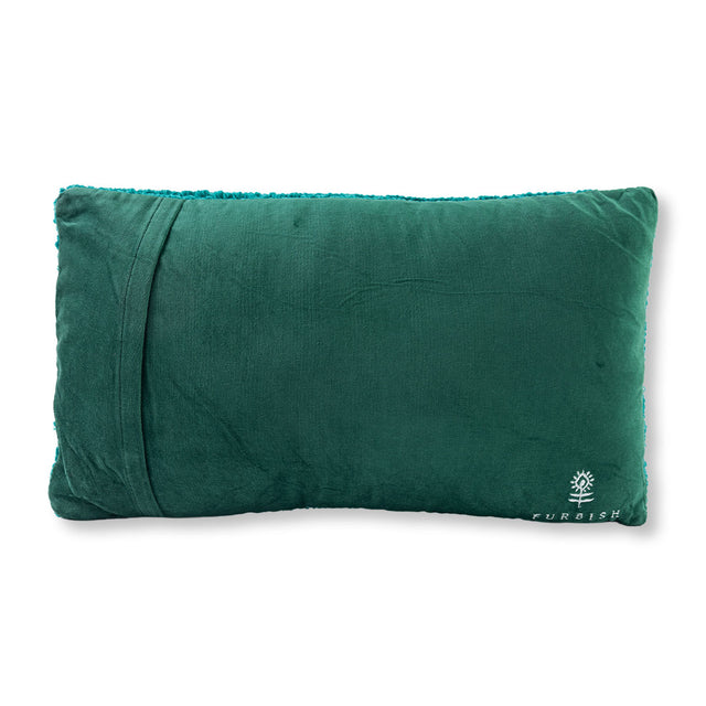 Green pillow with a brand logo on a white background