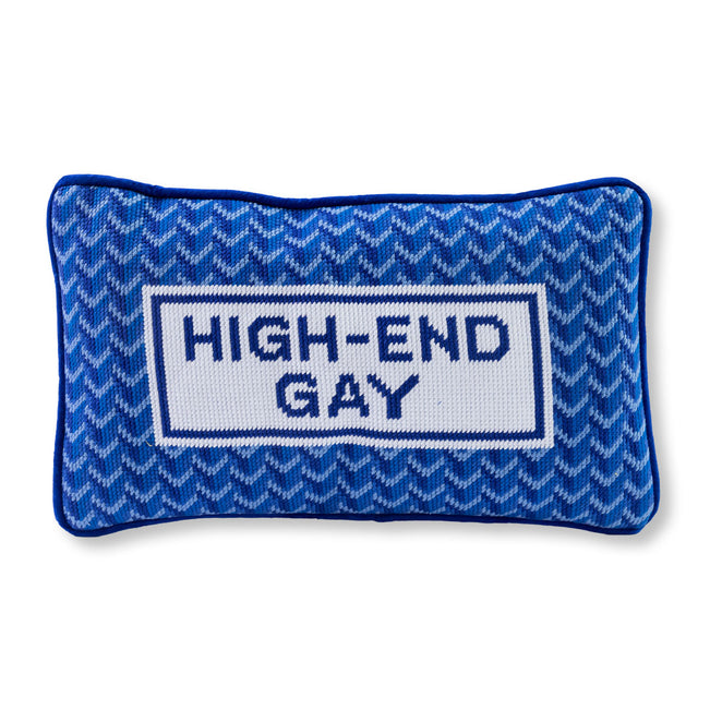Blue pillow with 'HIGH-END GAY' text on a white background