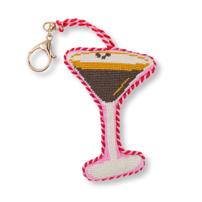 Martini glass keychain with red and white rope on a white background